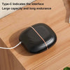 Black electronic device with Type-C interface on a wooden surface
