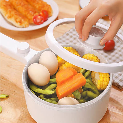 White food storage container with vegetables and eggs on a wooden table